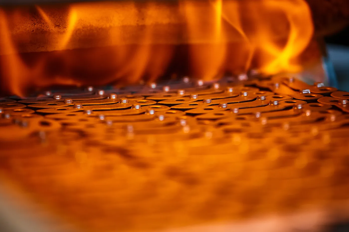 Metal chain being heat treated in a furnace